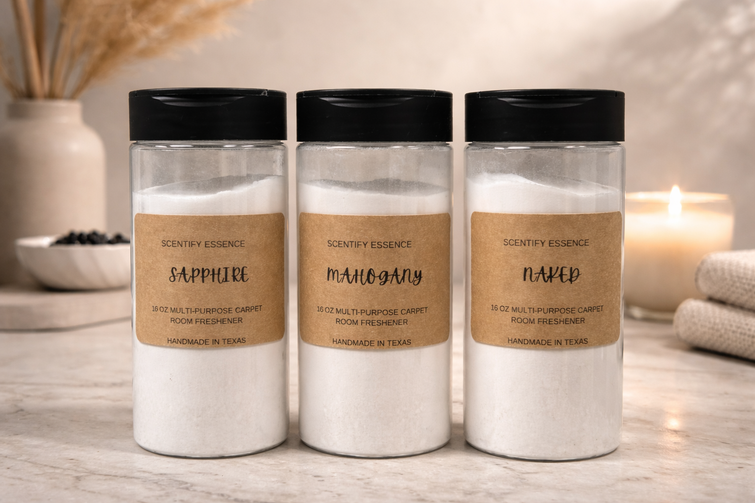 16 oz carpet freshener powders by Scentify Essence in Sapphire, Mahogany, and Naked scents, designed to eliminate odors and refresh home spaces