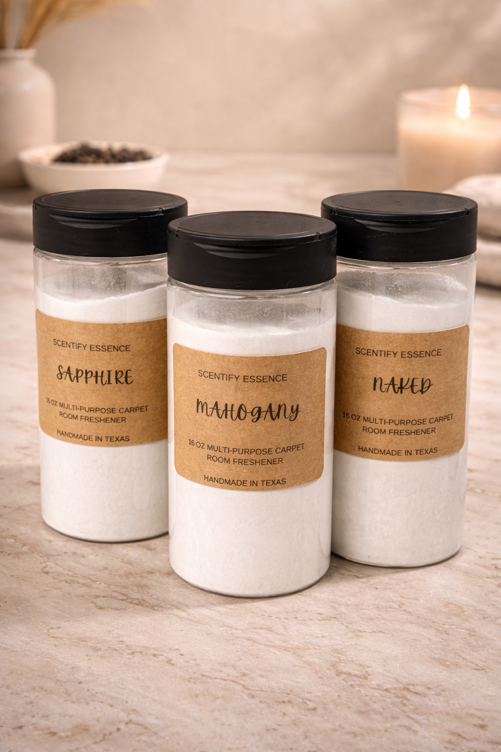 16 oz carpet freshener powders by Scentify Essence in Sapphire, Mahogany, and Naked scents, designed to eliminate odors and refresh home spaces